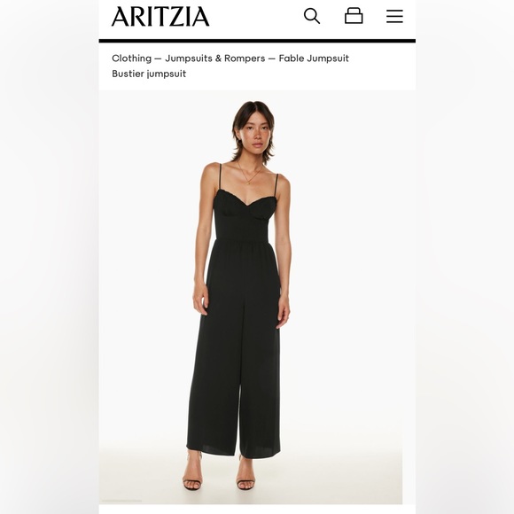 This is a jumpsuit with a lined bodice, sweetheart neckline with a ruffled trim. - Picture 1 of 5